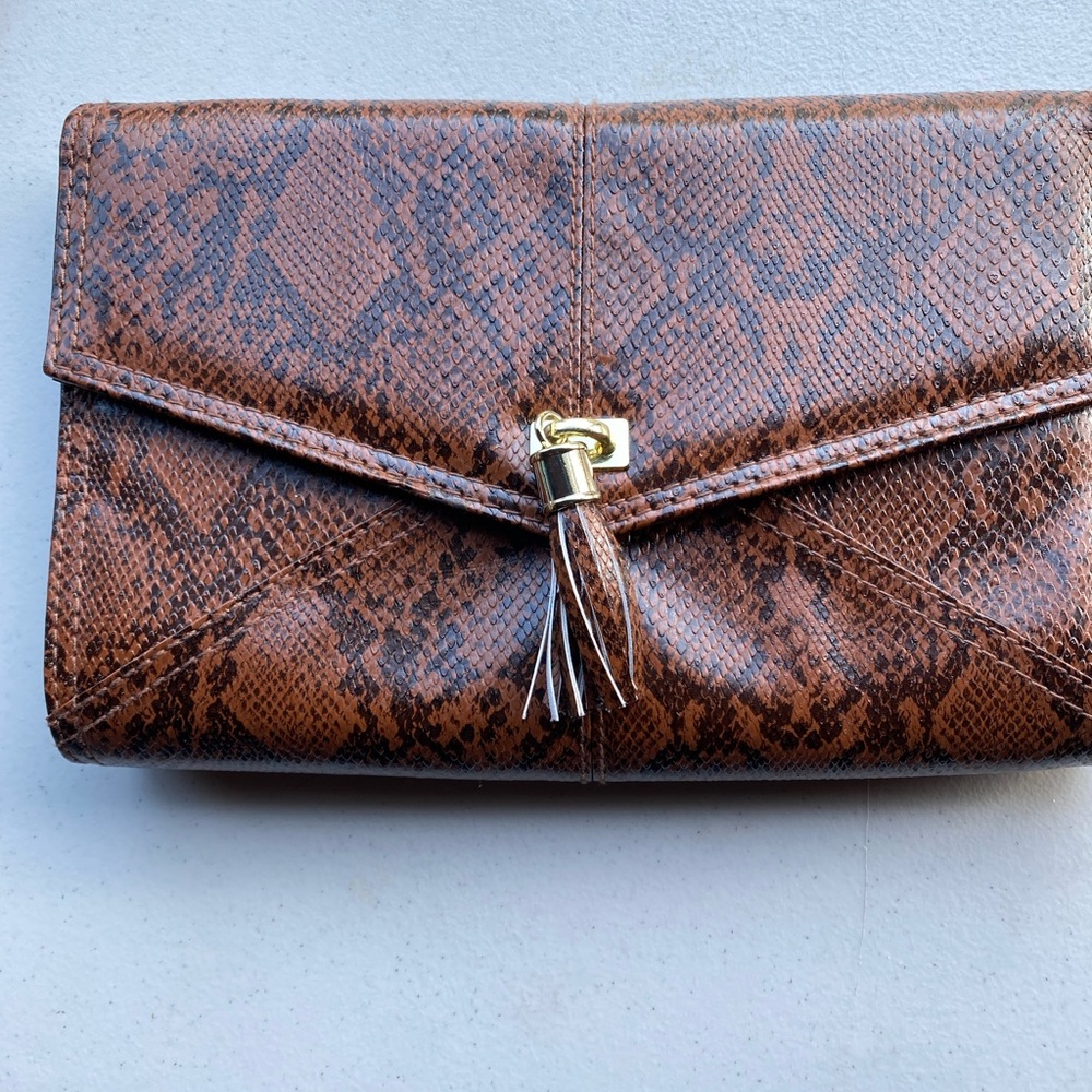 Brown animal print clutch.